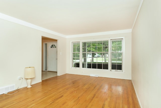 18210 Rainbow Dr, Lathrup Village, MI 48076 - spare room featuring light wood finished floors