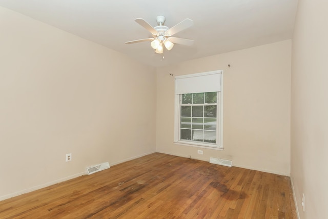 18210 Rainbow Dr, Lathrup Village, MI 48076 - spare room with hardwood / wood-style flooring and a ceiling fan