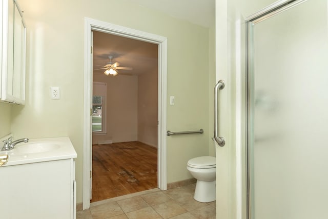 18210 Rainbow Dr, Lathrup Village, MI 48076 - bathroom featuring vanity, a ceiling fan, a shower with shower door, and tile patterned floors