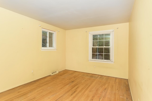 18210 Rainbow Dr, Lathrup Village, MI 48076 - unfurnished room featuring light wood finished floors