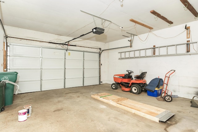 18210 Rainbow Dr, Lathrup Village, MI 48076 - garage with a garage door opener
