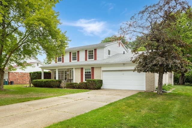 18210 Rainbow Dr, Lathrup Village, MI 48076 - traditional-style home featuring an attached garage, concrete driveway, covered porch, a front lawn, and brick siding