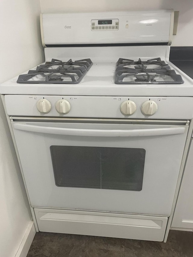 1111 S Quarterline Rd, Muskegon, MI 49442 - kitchen view of white gas range oven