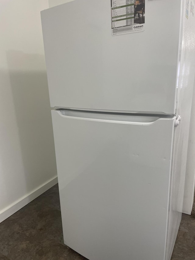 1111 S Quarterline Rd, Muskegon, MI 49442 - kitchen view of freestanding refrigerator