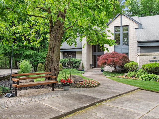 6224 Bromley Ct, West Bloomfield, MI 48322 - view of front of property featuring brick siding and a shingled roof