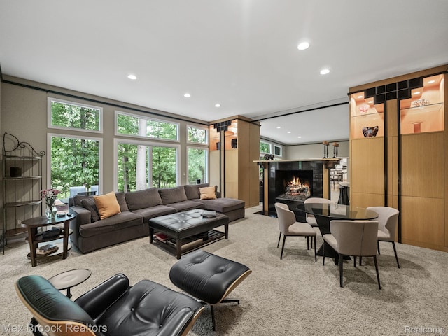6224 Bromley Ct, West Bloomfield, MI 48322 - living area with light colored carpet, a tiled fireplace, and recessed lighting