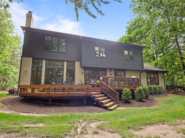 6224 Bromley Ct, West Bloomfield, MI 48322 - back of house featuring brick siding, a chimney, and a wooden deck