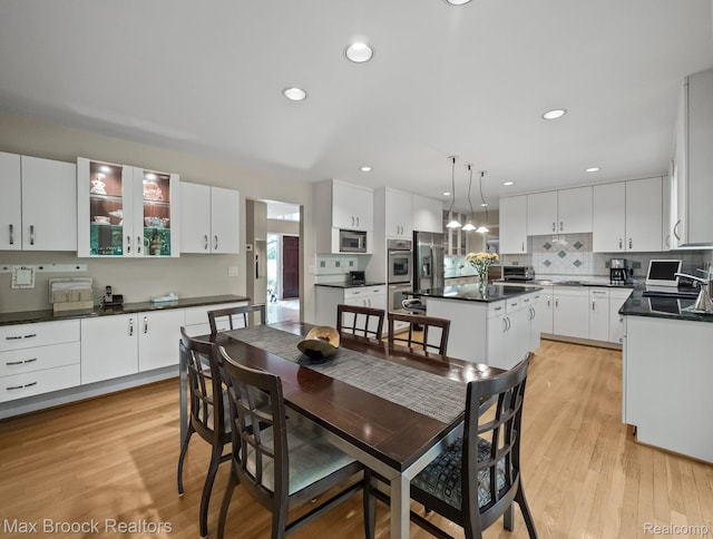 6224 Bromley Ct, West Bloomfield, MI 48322 - dining area with light wood-type flooring and recessed lighting