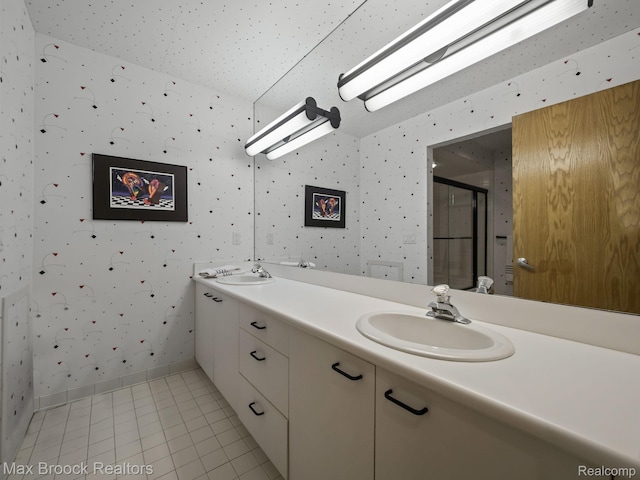 6224 Bromley Ct, West Bloomfield, MI 48322 - full bathroom with wallpapered walls, double vanity, a shower stall, and tile patterned flooring