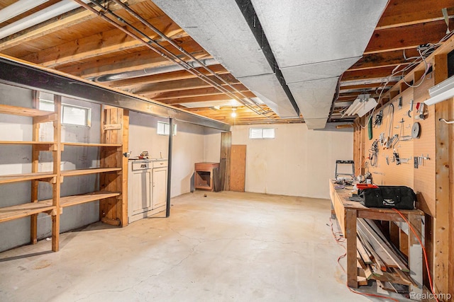 6392 Mckenzie Dr, Flint, MI 48507 - basement featuring a workshop area