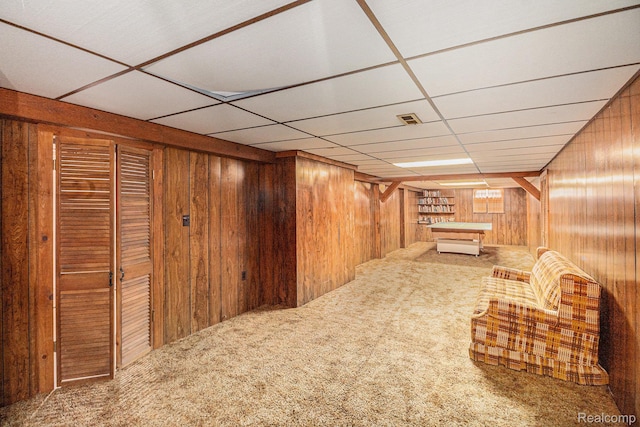 6392 Mckenzie Dr, Flint, MI 48507 - unfurnished room with wooden walls and carpet