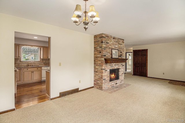 6392 Mckenzie Dr, Flint, MI 48507 - unfurnished living room with light carpet, a chandelier, and a fireplace