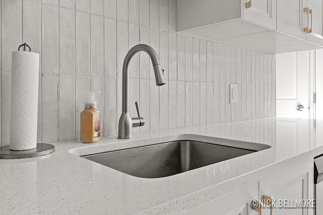 2036 Dawson Ave NE, Grand Rapids, MI 49505 - kitchen view of decorative backsplash and light stone counters