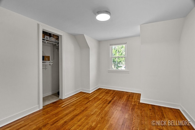 2036 Dawson Ave NE, Grand Rapids, MI 49505 - unfurnished bedroom featuring hardwood / wood-style floors and a closet