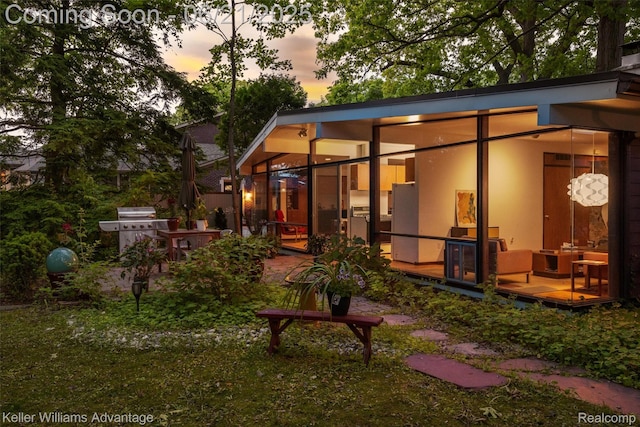 5959 Rosetta St, Dearborn Heights, MI 48127 - back of property featuring a wooden deck