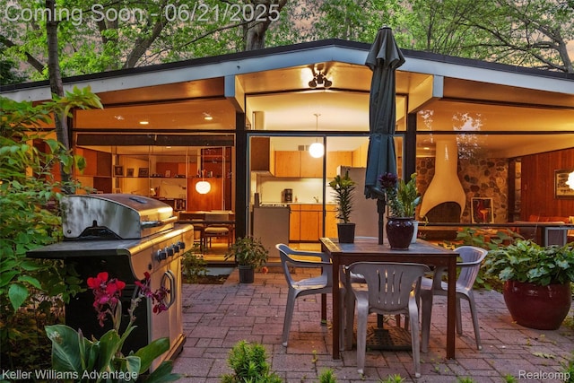 5959 Rosetta St, Dearborn Heights, MI 48127 - view of patio / terrace with a grill and outdoor dining space