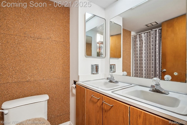 5959 Rosetta St, Dearborn Heights, MI 48127 - bathroom with toilet and double vanity