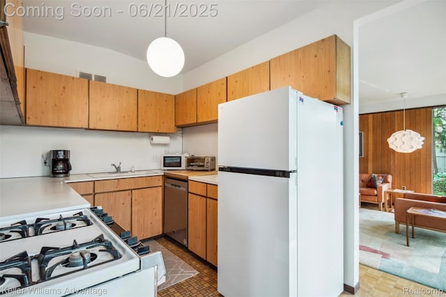 5959 Rosetta St, Dearborn Heights, MI 48127 - kitchen with white appliances, light countertops, and hanging light fixtures