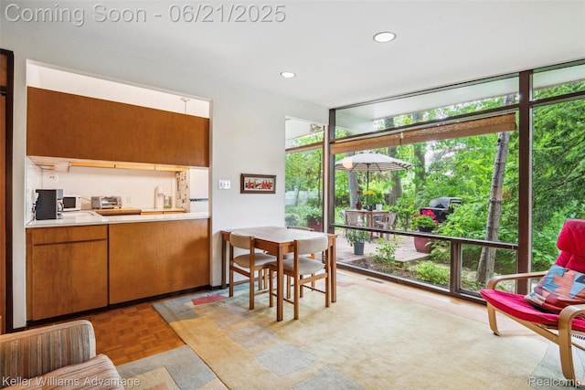5959 Rosetta St, Dearborn Heights, MI 48127 - dining area with healthy amount of natural light, expansive windows, and recessed lighting