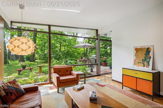 5959 Rosetta St, Dearborn Heights, MI 48127 - living room featuring floor to ceiling windows