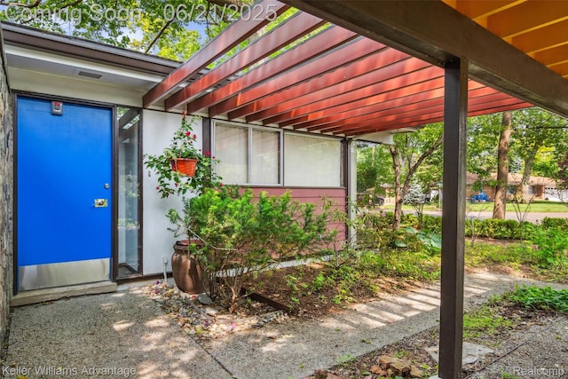 5959 Rosetta St, Dearborn Heights, MI 48127 - entrance to property with a pergola