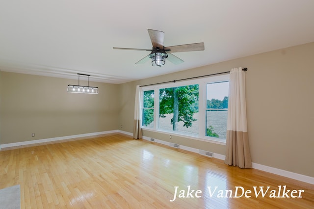 6835 Countryview Dr, Kalamazoo, MI 49009 - spare room featuring wood finished floors and ceiling fan