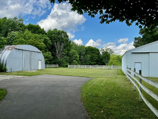 9910 8 Mile Rd, Ceresco, MI 49033 - view of yard featuring an outdoor structure and a pole building
