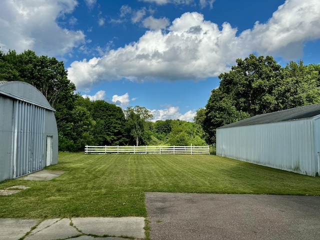 9910 8 Mile Rd, Ceresco, MI 49033 - view of yard featuring an outbuilding and an outdoor structure