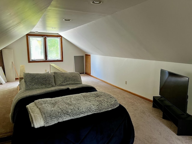 9910 8 Mile Rd, Ceresco, MI 49033 - bedroom featuring light carpet and lofted ceiling
