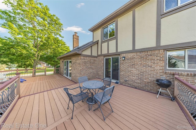 25006 Davenport Ave, Novi, MI 48374 - wooden terrace featuring outdoor dining area
