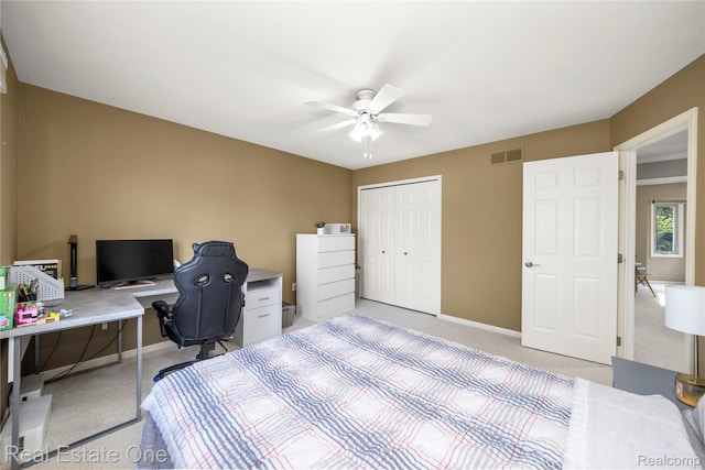 25006 Davenport Ave, Novi, MI 48374 - bedroom featuring light colored carpet, a closet, a desk, and ceiling fan