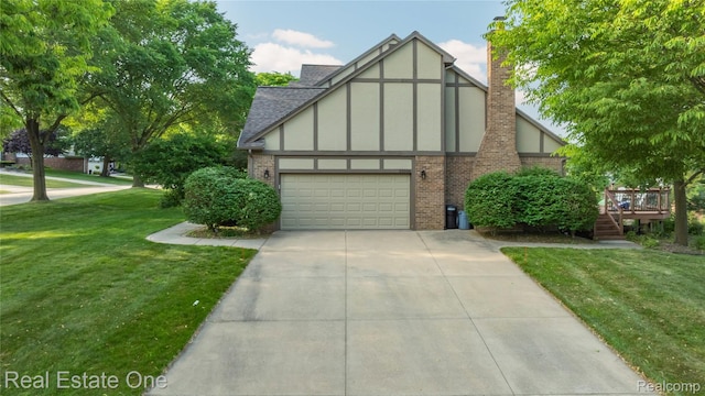 25006 Davenport Ave, Novi, MI 48374 - tudor home featuring concrete driveway, a front yard, brick siding, a deck, and board and batten siding