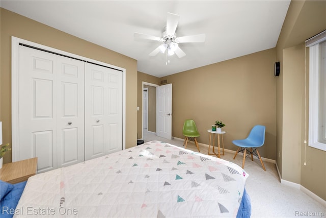 25006 Davenport Ave, Novi, MI 48374 - bedroom featuring a closet, light colored carpet, and a ceiling fan