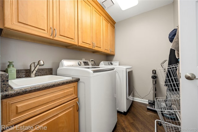 25006 Davenport Ave, Novi, MI 48374 - laundry room with cabinet space, dark wood finished floors, and washing machine and clothes dryer