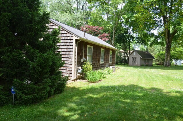 11279 E Cd Ave, Richland, MI 49083 - view of grassy yard featuring a storage unit