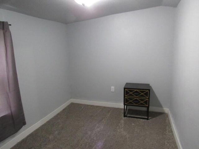 23786 Pokagon Hwy, Cassopolis, MI 49031 - carpeted empty room with lofted ceiling and baseboards