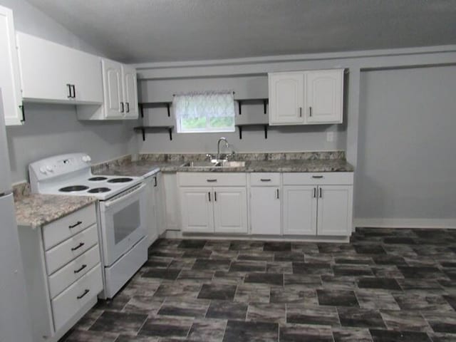 23786 Pokagon Hwy, Cassopolis, MI 49031 - kitchen with white range with electric stovetop, white cabinetry, and open shelves