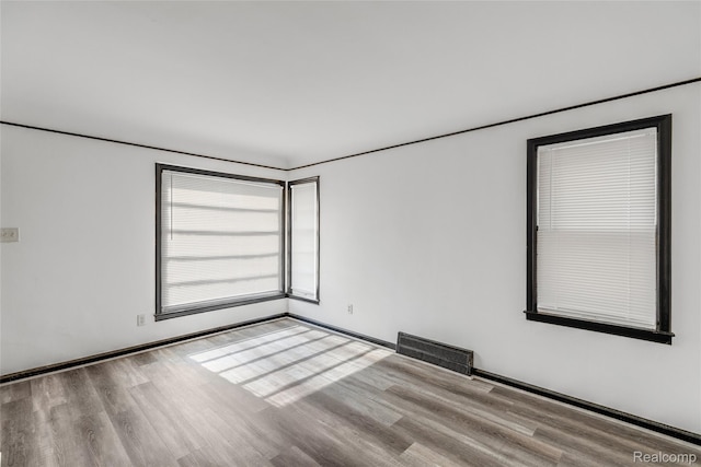 9938 Bramell, Redford, MI 48239 - empty room with wood finished floors