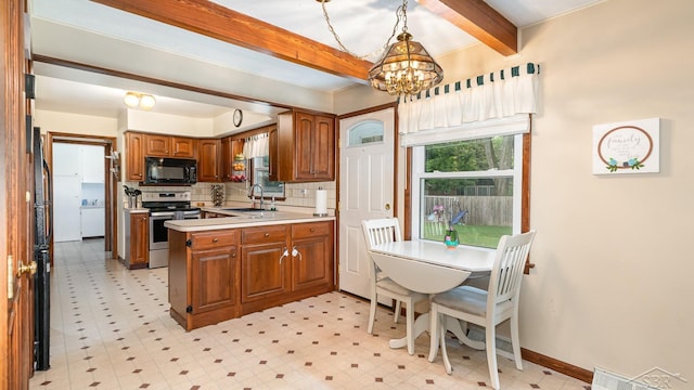 4561 Ashland Dr, Saginaw, MI 48638 - kitchen featuring black microwave, electric stove, brown cabinets, a chandelier, and a peninsula