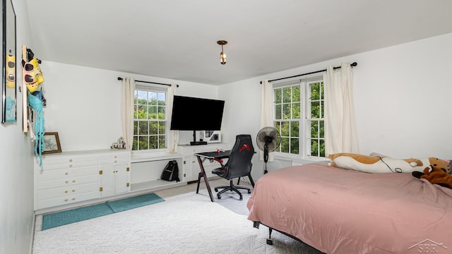 4561 Ashland Dr, Saginaw, MI 48638 - carpeted bedroom featuring an office area