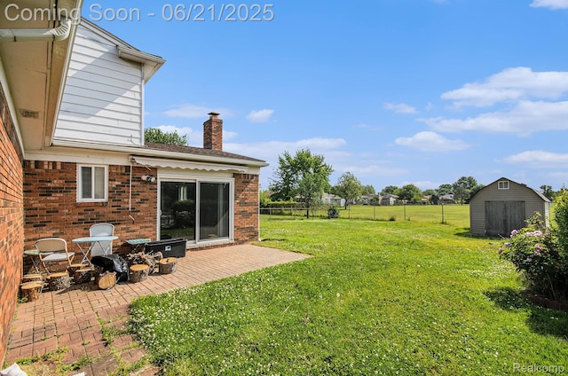 37718 Douglas Ct, Sterling Heights, MI 48310 - view of yard featuring a storage shed and a patio area