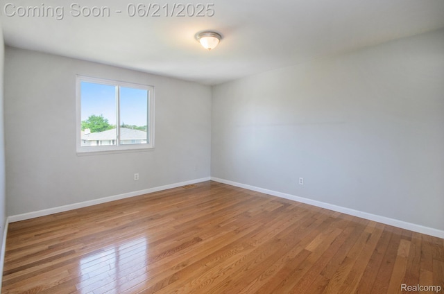 37718 Douglas Ct, Sterling Heights, MI 48310 - unfurnished room with light wood finished floors and baseboards