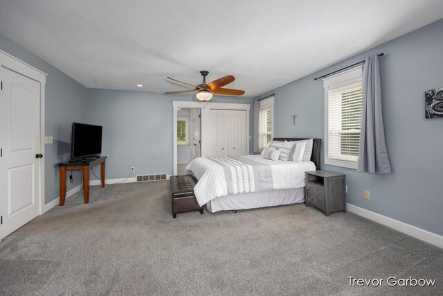 6770 Rivers Edge Ln, Middleville, MI 49333 - bedroom with carpet floors, ceiling fan, and a closet