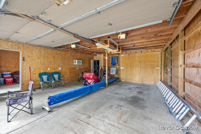6770 Rivers Edge Ln, Middleville, MI 49333 - garage with a garage door opener