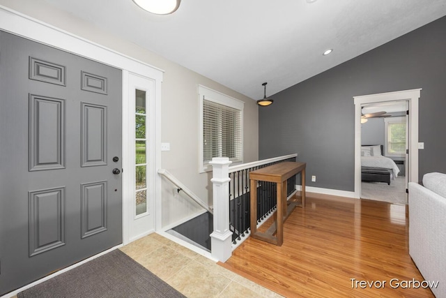 6770 Rivers Edge Ln, Middleville, MI 49333 - foyer featuring vaulted ceiling, wood finished floors, and ceiling fan