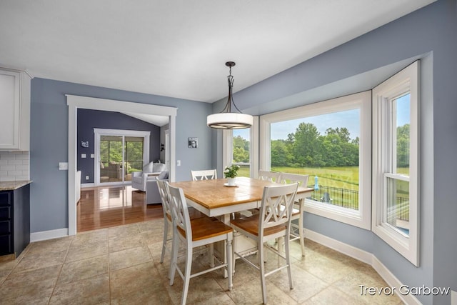 6770 Rivers Edge Ln, Middleville, MI 49333 - dining room featuring baseboards