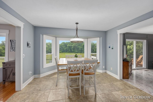 6770 Rivers Edge Ln, Middleville, MI 49333 - dining space featuring baseboards