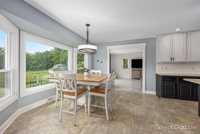 6770 Rivers Edge Ln, Middleville, MI 49333 - dining area with baseboards