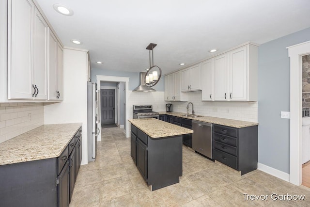 6770 Rivers Edge Ln, Middleville, MI 49333 - kitchen with stainless steel appliances, decorative backsplash, a kitchen island, wall chimney range hood, and decorative light fixtures