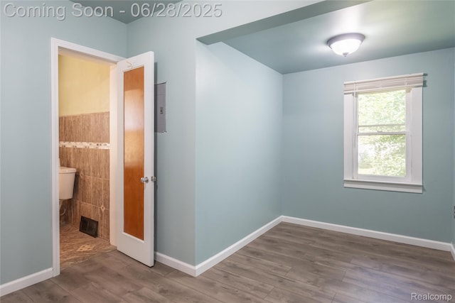 785 Kenilworth Ave, Pontiac, MI 48340 - spare room with wood finished floors and baseboards